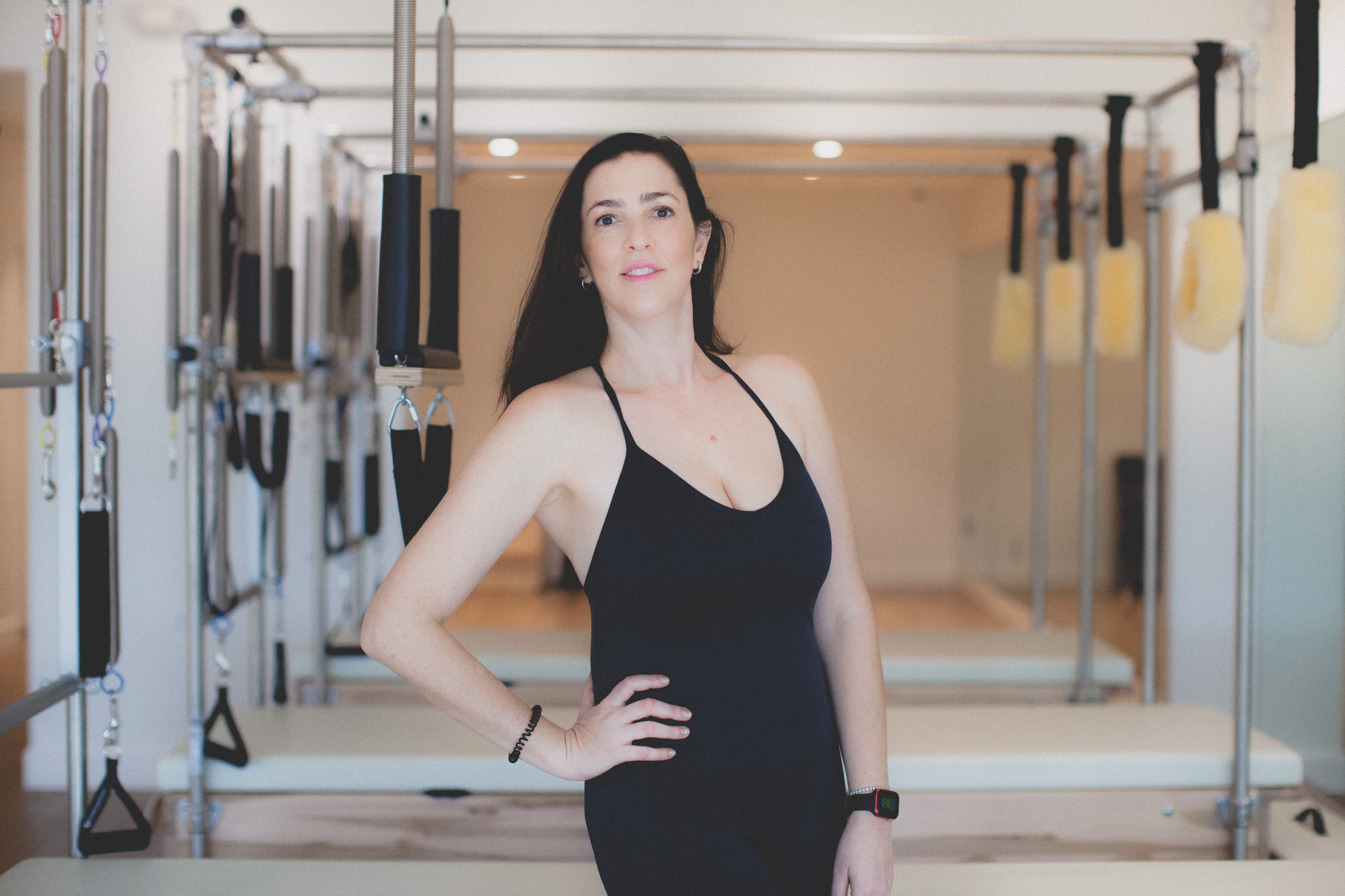 Elina standing in the apparatus studio